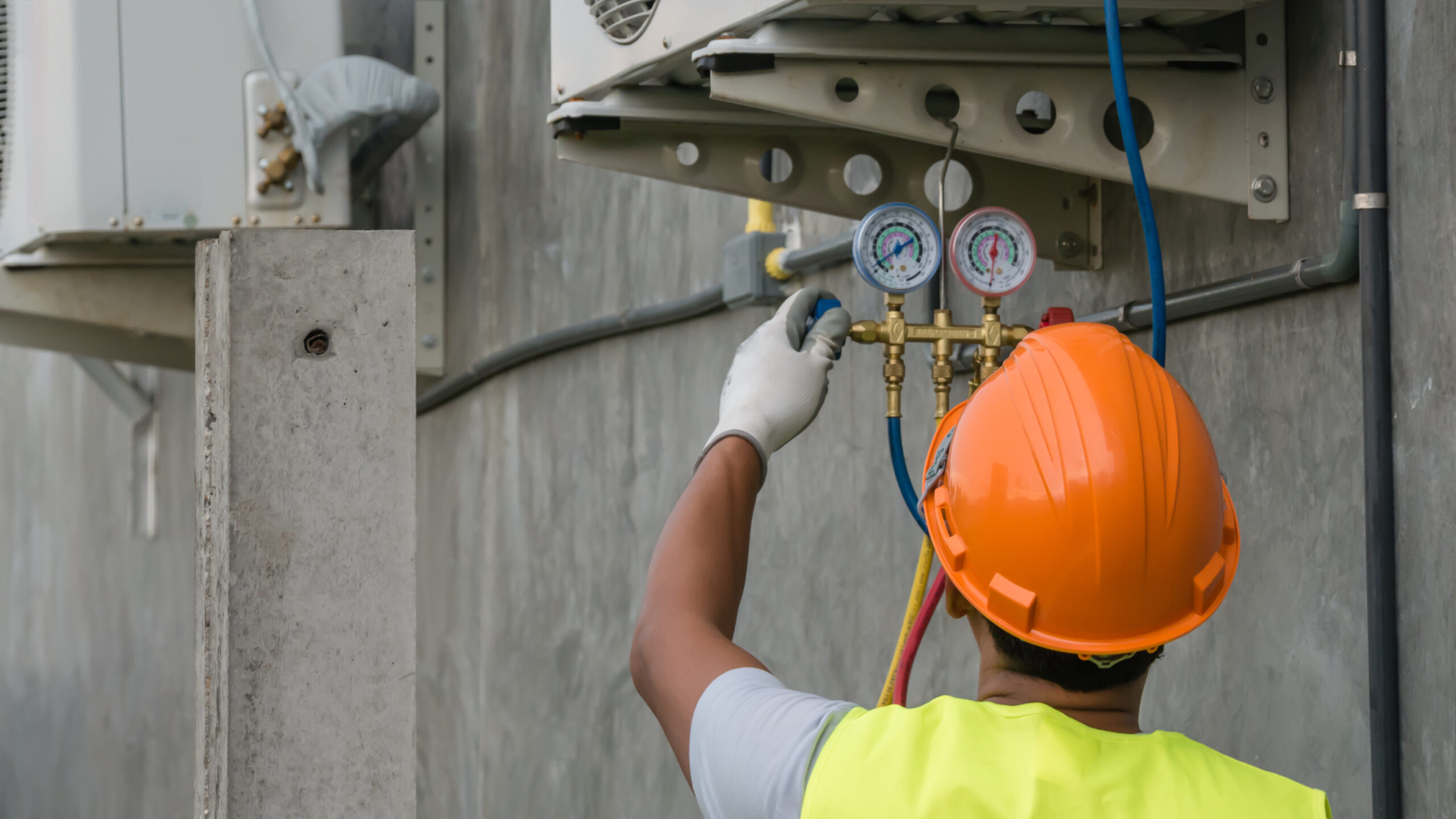 Commercial plumber inspecting heating system