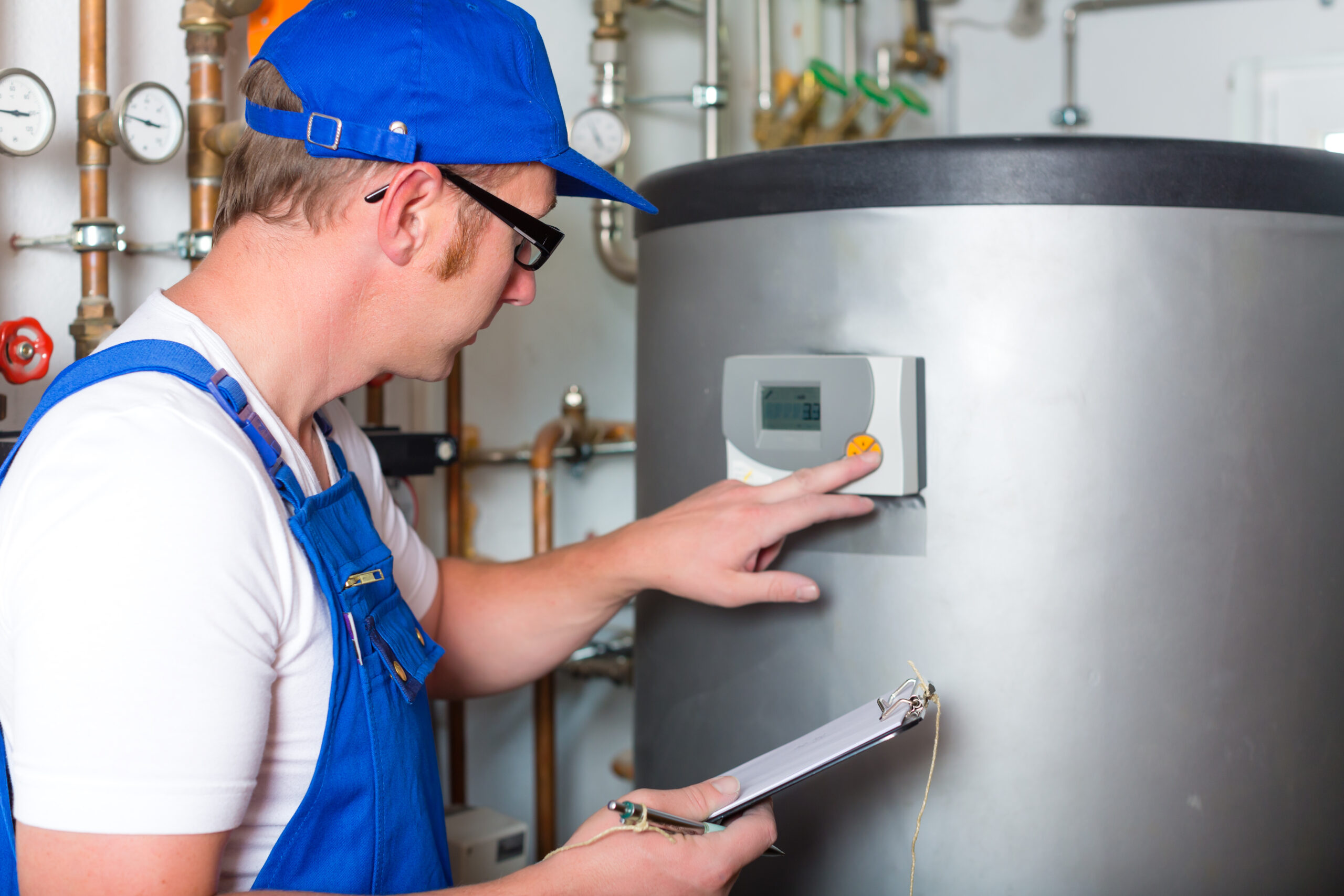 Hot Water Plumber Inspecting Unit